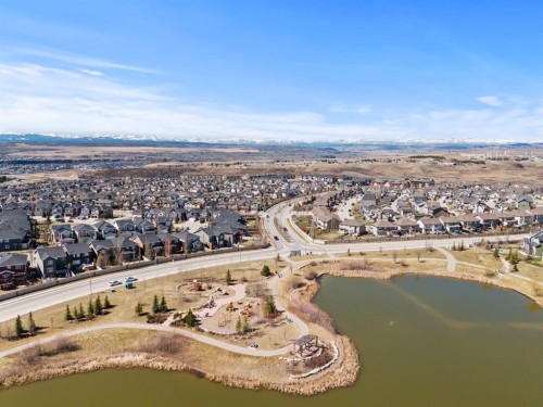 69 Sundown Grove, Cochrane, AB - Outdoor With Body Of Water With View