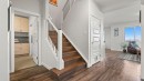 69 Sundown Grove, Cochrane, AB  - Indoor Photo Showing Other Room 