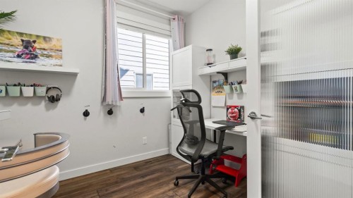 69 Sundown Grove, Cochrane, AB - Indoor Photo Showing Other Room