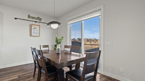 69 Sundown Grove, Cochrane, AB - Indoor Photo Showing Dining Room