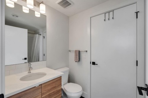 272 Seton Passage Se, Calgary, AB - Indoor Photo Showing Bathroom