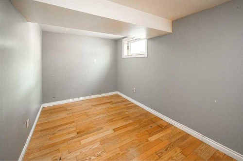 23 Edgedale Road Nw, Calgary, AB - Indoor Photo Showing Other Room