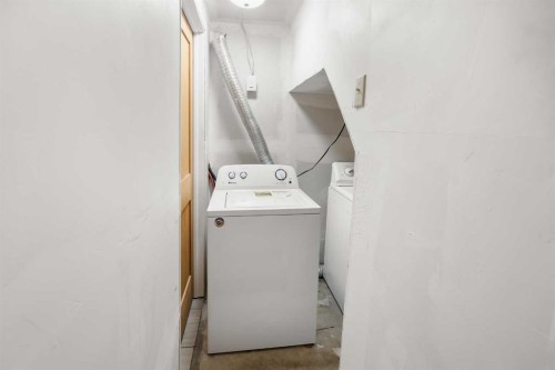 23 Edgedale Road Nw, Calgary, AB - Indoor Photo Showing Laundry Room