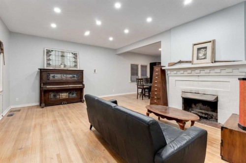 1424 Premier Way Sw, Calgary, AB - Indoor With Fireplace