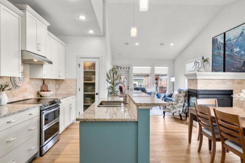 561 Boulder Creek Green Se, Langdon, AB - Indoor Photo Showing Kitchen With Upgraded Kitchen