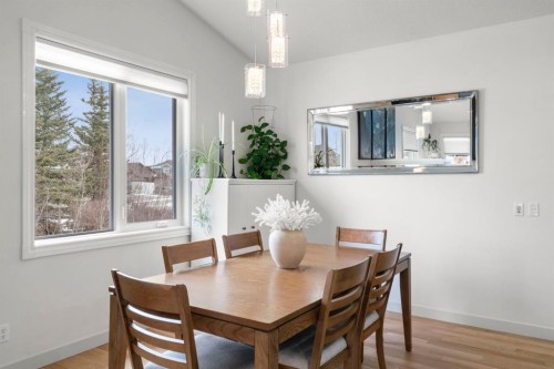 561 Boulder Creek Green Se, Langdon, AB - Indoor Photo Showing Dining Room