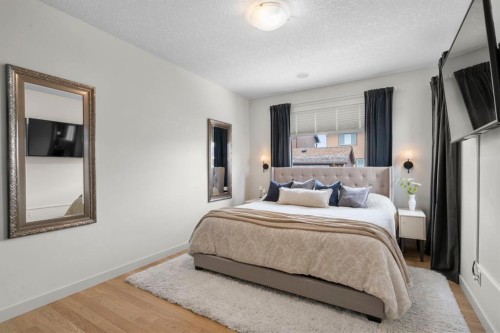 561 Boulder Creek Green Se, Langdon, AB - Indoor Photo Showing Bedroom