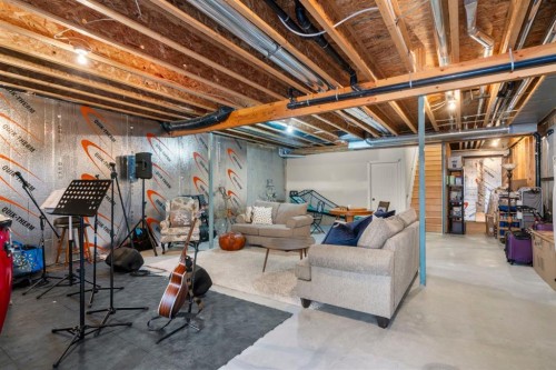561 Boulder Creek Green Se, Langdon, AB - Indoor Photo Showing Basement
