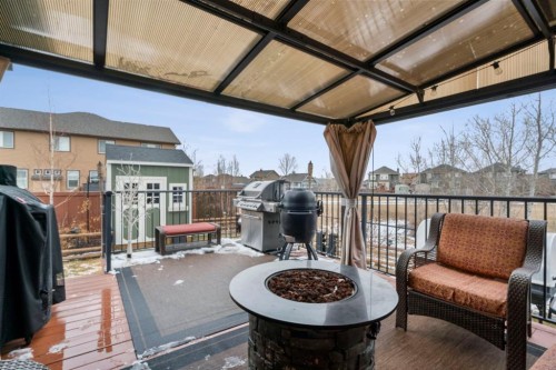 561 Boulder Creek Green Se, Langdon, AB - Outdoor With Deck Patio Veranda With Exterior