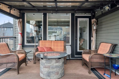 561 Boulder Creek Green Se, Langdon, AB - Outdoor With Deck Patio Veranda With Exterior