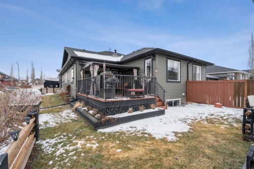 561 Boulder Creek Green Se, Langdon, AB - Outdoor With Deck Patio Veranda