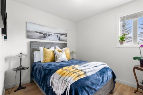 561 Boulder Creek Green Se, Langdon, AB - Indoor Photo Showing Bedroom