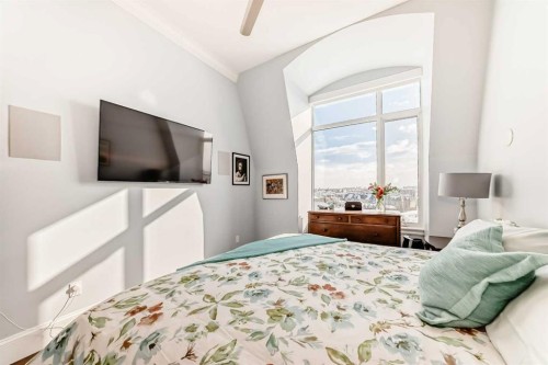 504-211 Quarry Way Se, Calgary, AB - Indoor Photo Showing Bedroom
