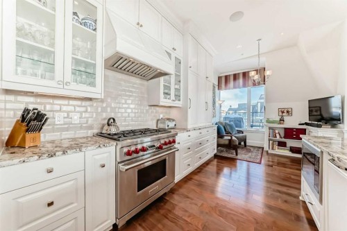 504-211 Quarry Way Se, Calgary, AB - Indoor Photo Showing Kitchen With Upgraded Kitchen