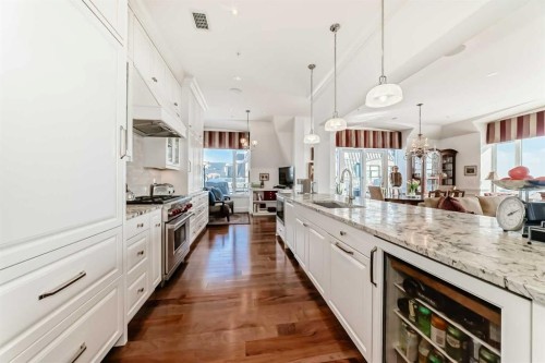 504-211 Quarry Way Se, Calgary, AB - Indoor Photo Showing Kitchen With Upgraded Kitchen