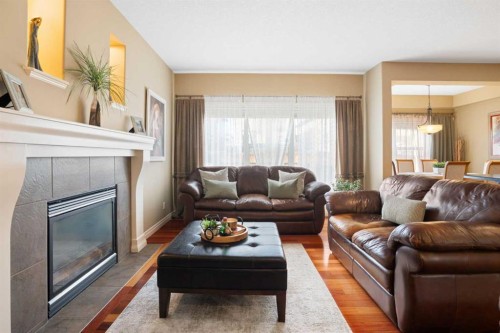 40 Bridleridge Lane Sw, Calgary, AB - Indoor Photo Showing Living Room With Fireplace