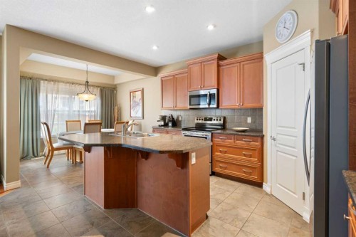 40 Bridleridge Lane Sw, Calgary, AB - Indoor Photo Showing Kitchen With Double Sink