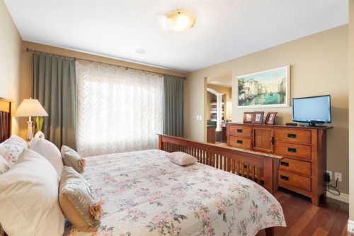 40 Bridleridge Lane Sw, Calgary, AB - Indoor Photo Showing Bedroom