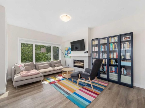 130 Crestridge Common Sw, Calgary, AB - Indoor Photo Showing Living Room With Fireplace
