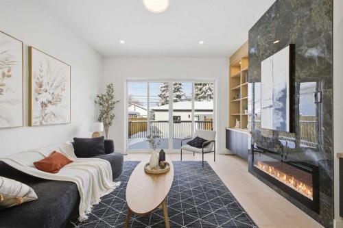 2105 7 Street Ne, Calgary, AB - Indoor Photo Showing Other Room With Fireplace