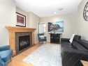 195 Royal Birkdale Crescent Nw, Calgary, AB  - Indoor Photo Showing Living Room With Fireplace 