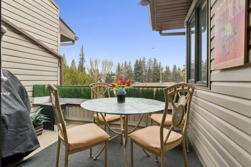 302-2425 90 Avenue Sw, Calgary, AB - Outdoor With Deck Patio Veranda With Exterior