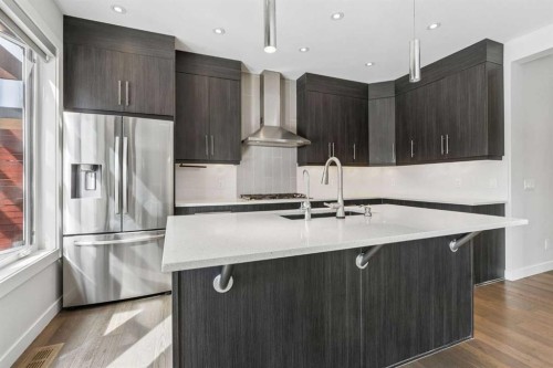 120 Aspen Dale Way Sw, Calgary, AB - Indoor Photo Showing Kitchen With Stainless Steel Kitchen With Upgraded Kitchen