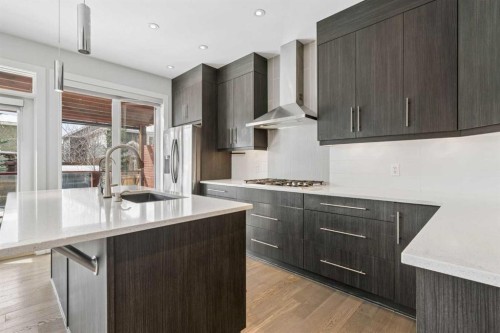 120 Aspen Dale Way Sw, Calgary, AB - Indoor Photo Showing Kitchen With Upgraded Kitchen