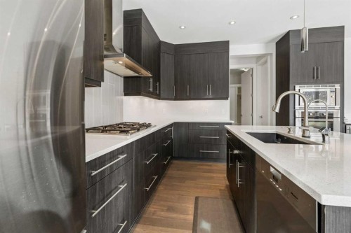 120 Aspen Dale Way Sw, Calgary, AB - Indoor Photo Showing Kitchen With Upgraded Kitchen