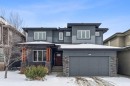 120 Aspen Dale Way Sw, Calgary, AB  - Outdoor With Facade 