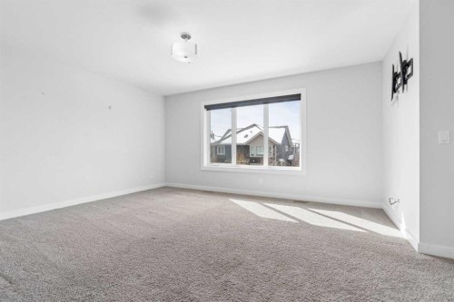 120 Aspen Dale Way Sw, Calgary, AB - Indoor Photo Showing Other Room