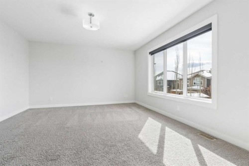 120 Aspen Dale Way Sw, Calgary, AB - Indoor Photo Showing Other Room