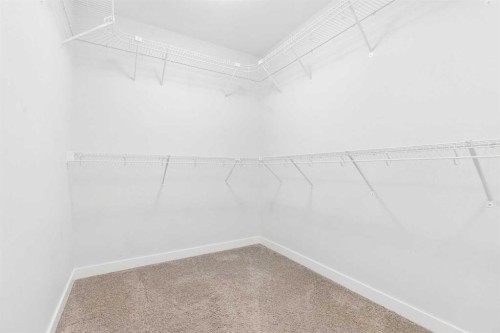 120 Aspen Dale Way Sw, Calgary, AB - Indoor With Storage