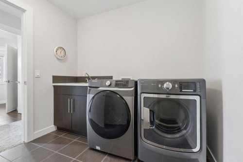 120 Aspen Dale Way Sw, Calgary, AB - Indoor Photo Showing Laundry Room