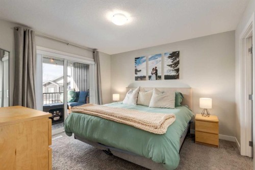 212 Crestbrook Common Sw, Calgary, AB - Indoor Photo Showing Bedroom