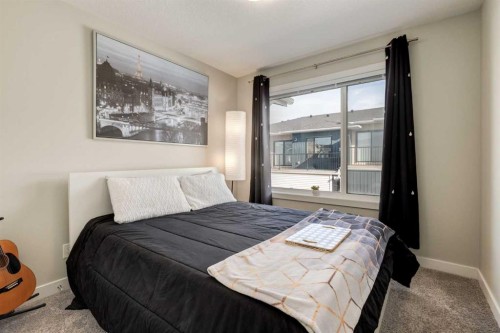 212 Crestbrook Common Sw, Calgary, AB - Indoor Photo Showing Bedroom