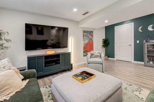 212 Crestbrook Common Sw, Calgary, AB - Indoor Photo Showing Living Room