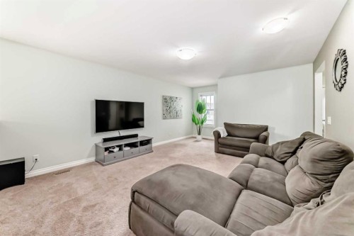 98 Mahogany Way Se, Calgary, AB - Indoor Photo Showing Living Room