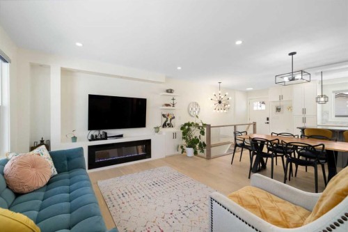 523 Athlone Road Se, Calgary, AB - Indoor Photo Showing Living Room With Fireplace