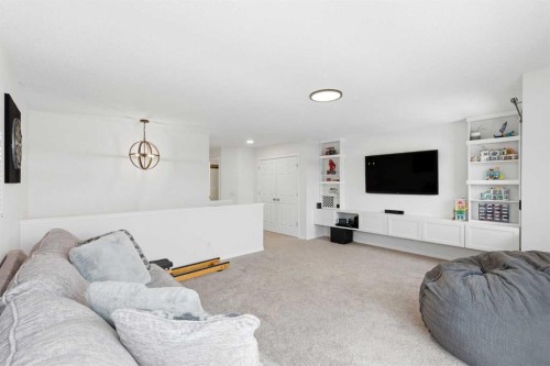 62 Walden Court Se, Calgary, AB - Indoor Photo Showing Living Room