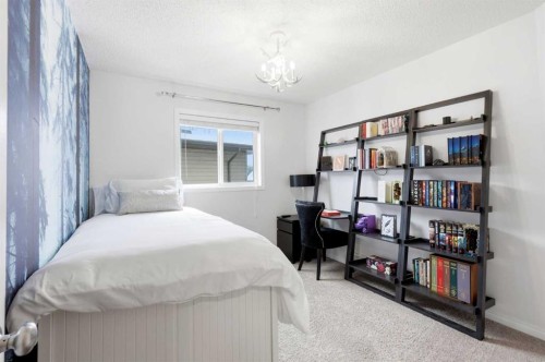 62 Walden Court Se, Calgary, AB - Indoor Photo Showing Bedroom