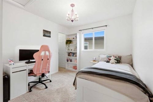 62 Walden Court Se, Calgary, AB - Indoor Photo Showing Bedroom