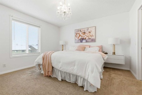 62 Walden Court Se, Calgary, AB - Indoor Photo Showing Bedroom