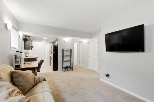 62 Walden Court Se, Calgary, AB - Indoor Photo Showing Living Room