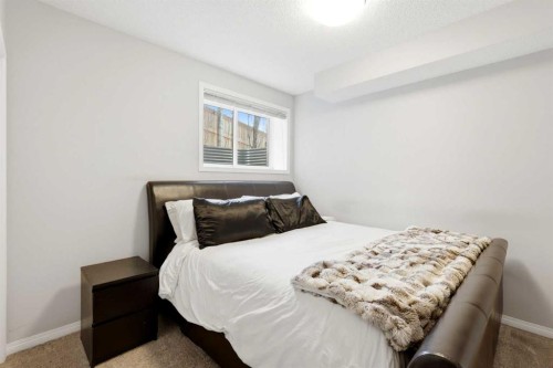 62 Walden Court Se, Calgary, AB - Indoor Photo Showing Bedroom