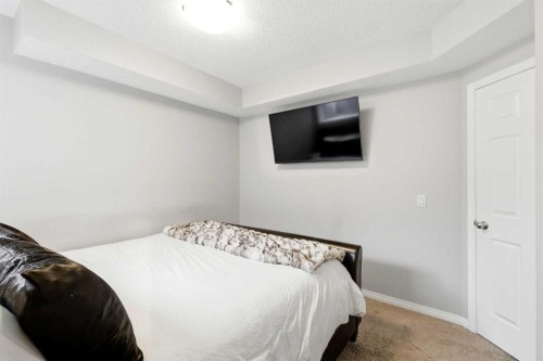 62 Walden Court Se, Calgary, AB - Indoor Photo Showing Bedroom