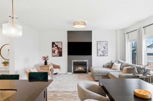 62 Walden Court Se, Calgary, AB - Indoor Photo Showing Living Room With Fireplace