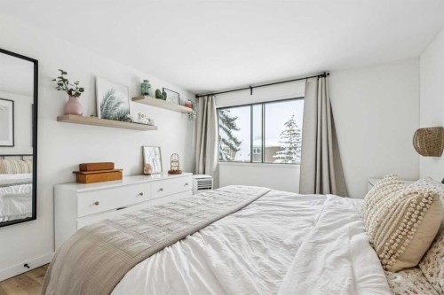 1414 Ranchlands Road Nw, Calgary, AB - Indoor Photo Showing Bedroom