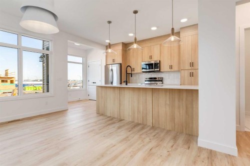 454 River Avenue, Cochrane, AB - Indoor Photo Showing Kitchen With Upgraded Kitchen