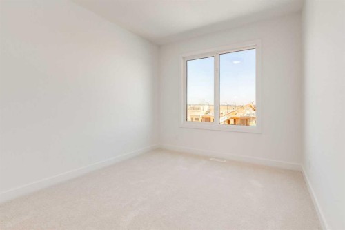 454 River Avenue, Cochrane, AB - Indoor Photo Showing Other Room